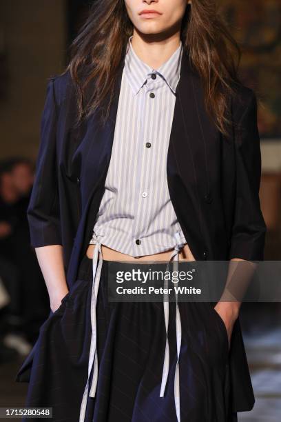 Model, fashion detail, walks the runway during the Ujoh Womenswear Spring/Summer 2024 show as part of Paris Fashion Week on October 03, 2023 in...