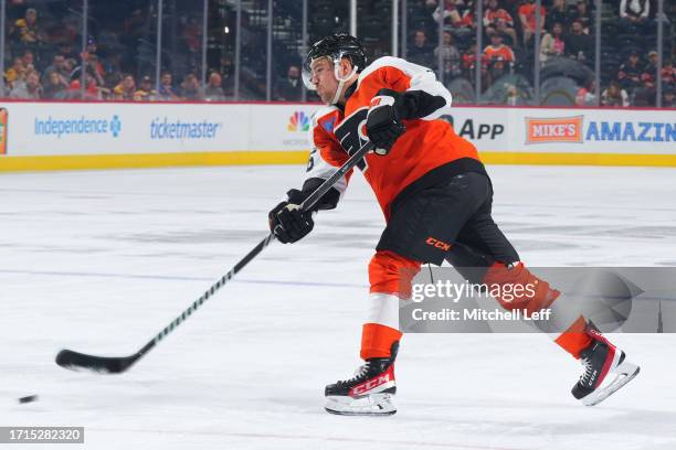 Bobby Brink of the Philadelphia Flyers shoots the puck against the Boston Bruins during the preseason game at the Wells Fargo Center on October 2,...