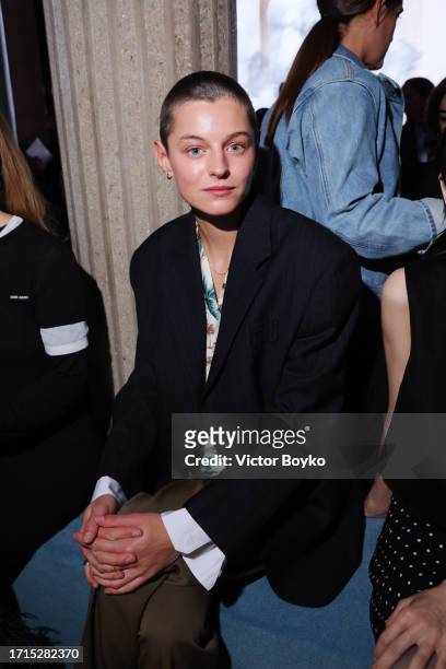 Emma Corrin attends the Miu Miu Womenswear S/S 2024 show as part of Paris Fashion Week at Palais d'Iena on October 03, 2023 in Paris, France.