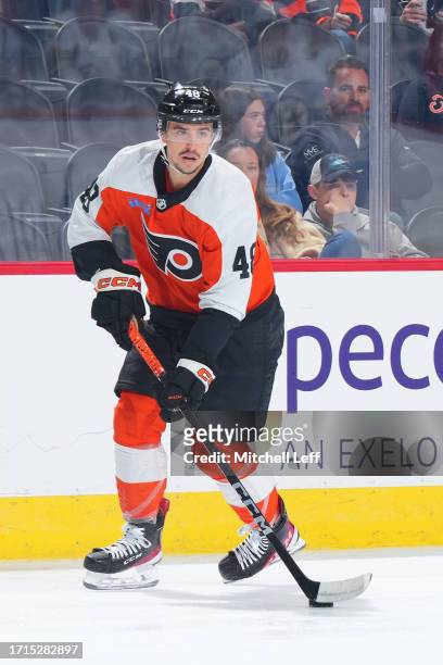 Morgan Frost of the Philadelphia Flyers controls the puck against the Boston Bruins during the preseason game at the Wells Fargo Center on October 2,...