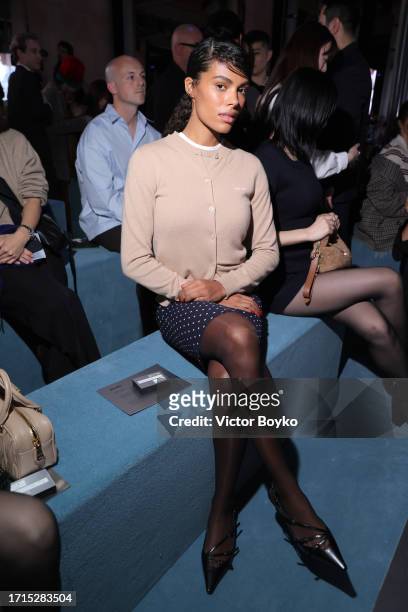 Tina Kunakey attends the Miu Miu Womenswear S/S 2024 show as part of Paris Fashion Week at Palais d'Iena on October 03, 2023 in Paris, France.