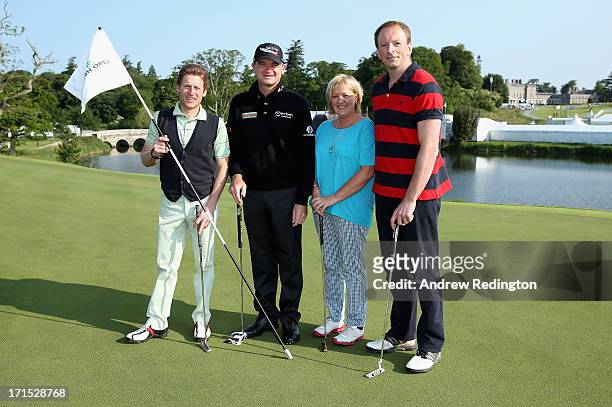Paul Lawrie of Scotland poses with his team during the pro-am event prior to the start of the Irish Open at Carton House Golf Club on June 26, 2013...