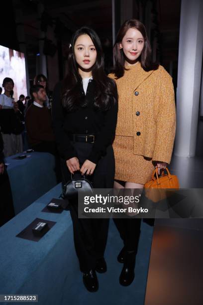 Zhao Jinmai and Yoona Lim attend the Miu Miu Womenswear S/S 2024 show as part of Paris Fashion Week at Palais d'Iena on October 03, 2023 in Paris,...