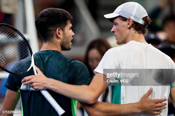 Jannik Sinner of Italy consoles Carlos Alcaraz of Spain after their Men's Singles Semi-final match on day eight of 2023 China Open at the National...