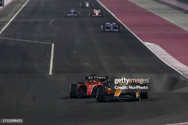 Charles Leclerc of Monaco, Scuderia Ferrari, SF-23 - Ferrari, action 04 Lando Norris of United Kingdom, Mclaren Formula 1 Team, MCL60 - Mercedes,...