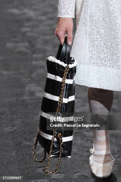 Model walks the runway, bag details, during the Chanel Womenswear Spring/Summer 2024 show as part of Paris Fashion Week on October 03, 2023 in Paris,...