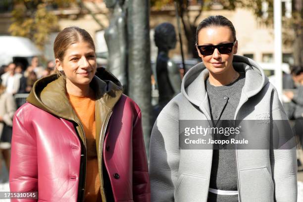Aleksandra Novikova and Nataly Osmann attend the Miu Miu Womenswear Spring/Summer 2024 show as part of Paris Fashion Week on October 03, 2023 in...