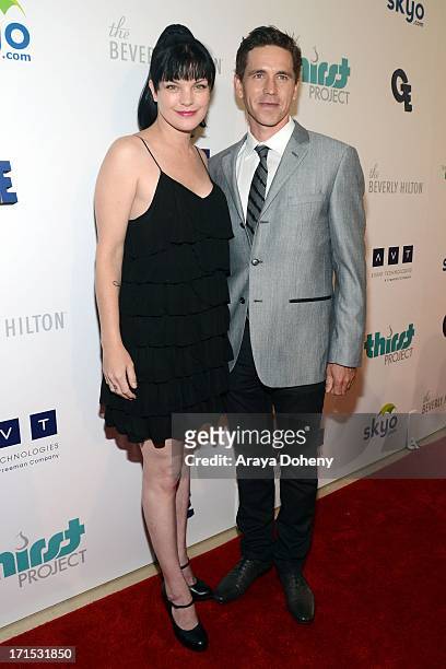 Pauley Perrette and Brian Dietzen attend the 4th Annual Thirst Gala at The Beverly Hilton Hotel on June 25, 2013 in Beverly Hills, California.