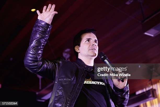 Host Hal Sparks speaks on stage at Logo's "Hot 100" party at Drai's Hollywood on June 25, 2013 in Hollywood, California.
