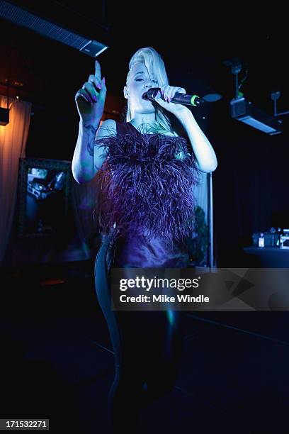 Iggy Azalea performs on stage at Logo's "Hot 100" party at Drai's Hollywood on June 25, 2013 in Hollywood, California.