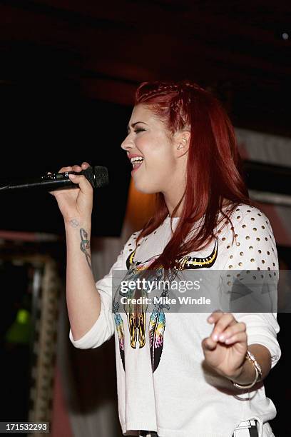Nikki Williams performs on stage at Logo's "Hot 100" party at Drai's Hollywood on June 25, 2013 in Hollywood, California.