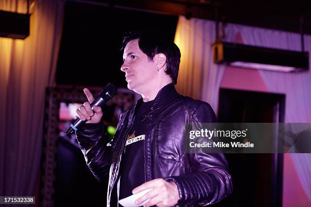 Host Hal Sparks speaks on stage at Logo's "Hot 100" party at Drai's Hollywood on June 25, 2013 in Hollywood, California.