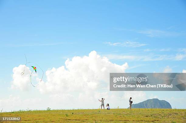 a battle kite and 3 people - keelung stock pictures, royalty-free photos & images