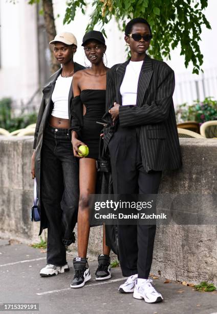Models seen with outside the Zimmermann show during the Womenswear Spring/Summer 2024 as part of Paris Fashion Week on October 02, 2023 in Paris,...