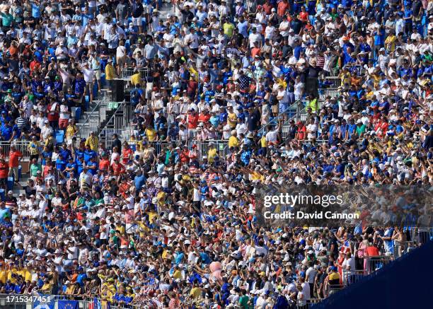 Massed crowds in teh grandstand beside the first tee during the Sunday singles matches of the 2023 Ryder Cup at Marco Simone Golf Club on October 01,...