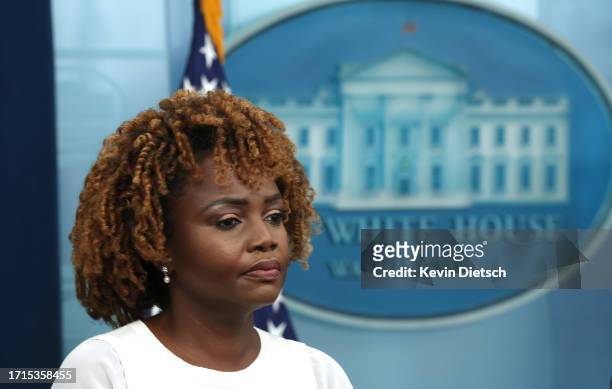 White House Press Secretary Karine Jean-Pierre listens as John Kirby, Coordinator for Strategic Communications at the National Security Council in...