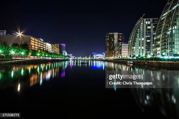 huron basin, salford quays by night - manchester skyline stock pictures, royalty-free photos & images