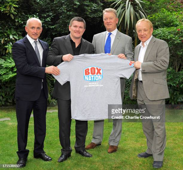 Barry McGuigan, Ricky Hatton, Frank Warren and Frank Maloney with a Boxnation t-shirt during the Boxnation Press Conference on June 26, 2013 in...
