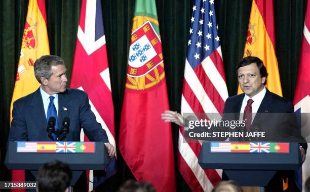 President George W. Bush listens to Portuguese Prime Minister Jose Manuel Durao Barosso during a joint press conference following meetings to discuss...