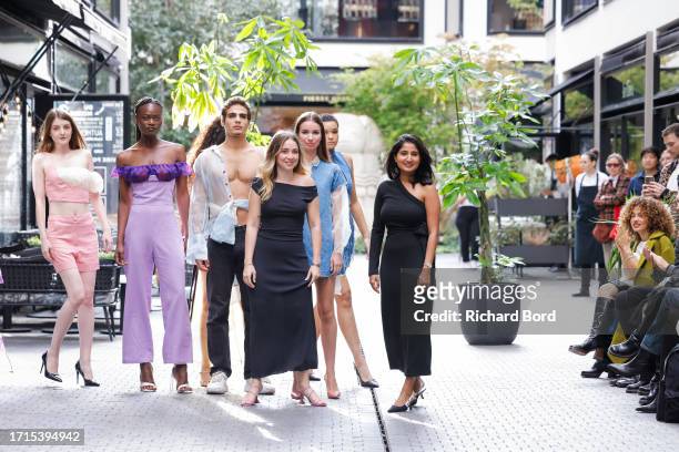 Models and designers Lyn Abdel Rahman and Filza Marri acknowledge the audience after the Le Fil Womenswear Spring/Summer 2024 show as part of Paris...