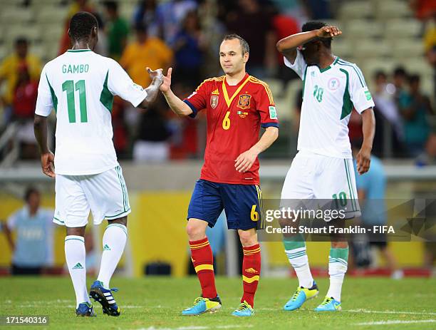 Andres Iniesta of Spain shakes hands with Mohammed Gambo of Nigeria after the FIFA Confederations Cup Brazil 2013 Group B match between Nigeria and...