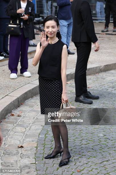 Dong Jie attends the Miu Miu Womenswear Spring/Summer 2024 show as part of Paris Fashion Week on October 03, 2023 in Paris, France.