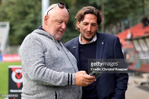 Peter Jackwerth of FC Ingolstadt and sporting director Ivica Grlic of FC Ingolstadt are seen prior to the 3. Liga match between Viktoria Köln and FC...