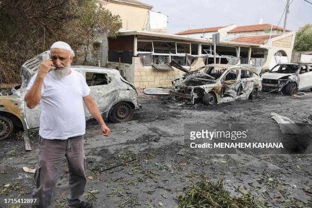 Man inspects the damage in the southern Israeli city of Ashkelon after a rocket attack from Gaza on October 9, 2023. Israel relentlessly pounded the...