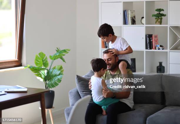 father trying to work from home - epidemic sound stock pictures, royalty-free photos & images