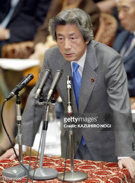 Japanese Prime Minister Junichiro Koizumi answers a question during a budget committee session of the House of Representatives at Diet in Tokyo, 27...