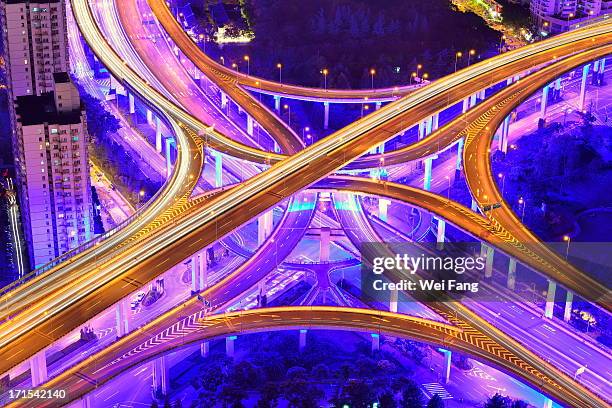 aerial view of a multi-level stack interchange - stack_interchange stock pictures, royalty-free photos & images