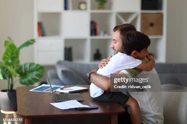 father trying to work from home - epidemic sound stock pictures, royalty-free photos & images