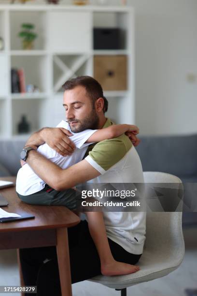 father trying to work from home - epidemic sound stock pictures, royalty-free photos & images