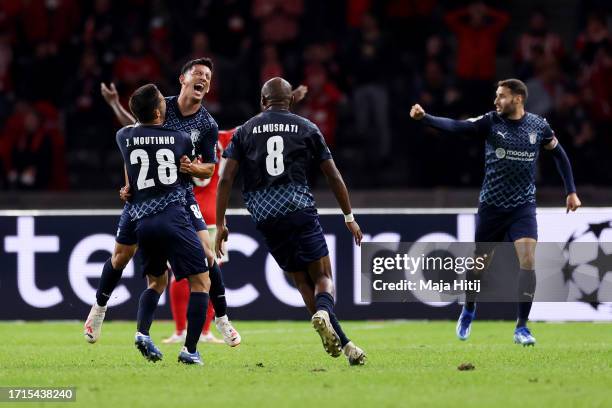 Andre Castro of SC Braga celebrates with teammates after scoring the team's third goal during the UEFA Champions League match between 1. FC Union...