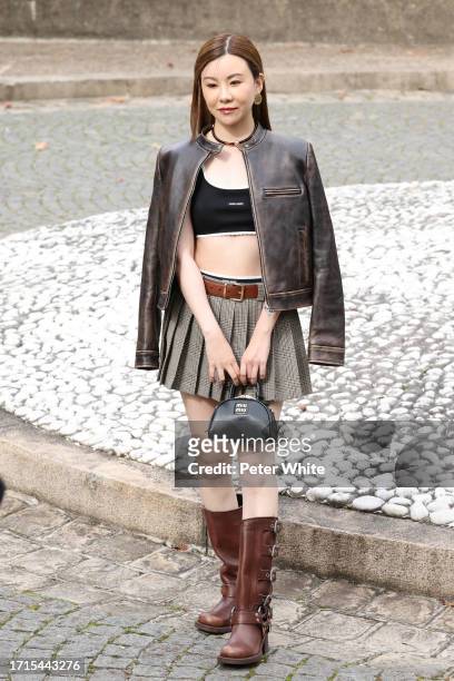 Guest attends the Miu Miu Womenswear Spring/Summer 2024 show as part of Paris Fashion Week on October 03, 2023 in Paris, France.