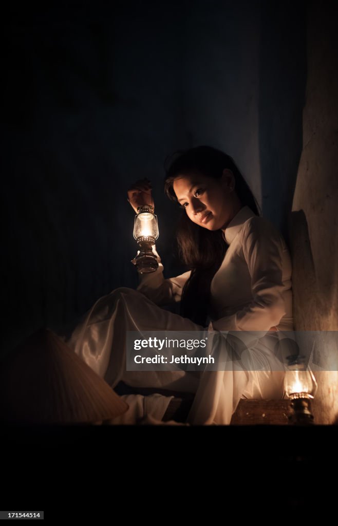 Ao Dai with the oil lamp light