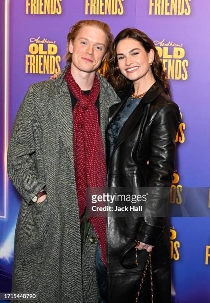 Freddie Fox and Lily James attend Stephen Sondheim's "Old Friends" Opening Night at Gielgud Theatre on October 03, 2023 in London, England.