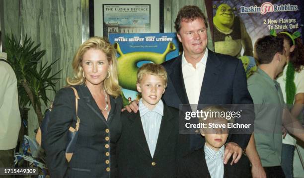 View of married couple, American fashion designer Kathy Hilton and businessman Richard 'Rick' Hilton, with their children, Barron Hilton II and...