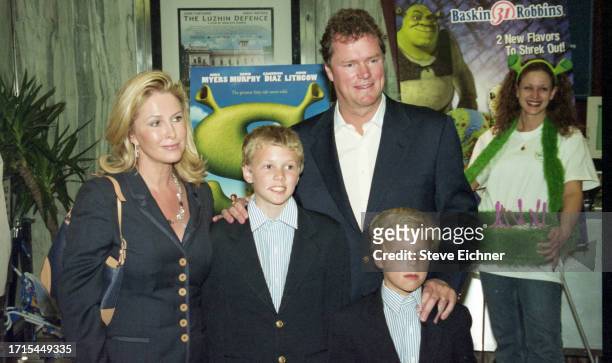 View of married couple, American fashion designer Kathy Hilton and businessman Richard 'Rick' Hilton, with their children, Barron Hilton II and...