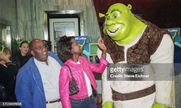Married American broadcast journalists Al Roker and Deborah Roberts attend a screening of 'Shrek,' New York, New York, May 15, 2001.