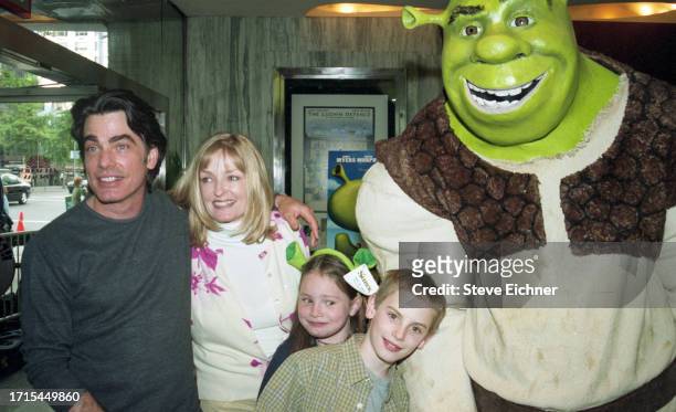 View of married couple, actor Peter Gallagher and Paula Harwood, with their children Kathryn and James Gallagher as they attend a screening of...