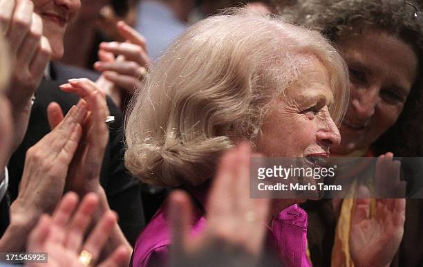Supporters applaud Defense of Marriage Act plaintiff Edith "Edie" Windsor at a press conference in Manhattan following the U.S. Supreme Court ruling...