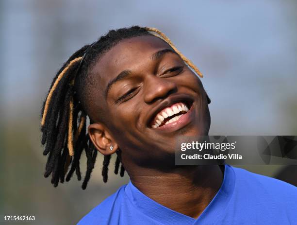 Rafael Leao of AC Milan smiles during a AC Milan training session at Milanello on October 03, 2023 in Cairate, Italy.