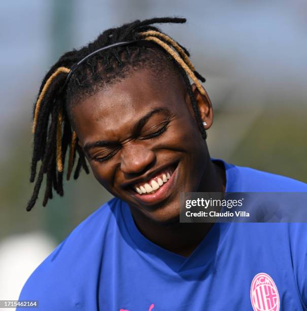 Rafael Leao of AC Milan smiles during a AC Milan training session at Milanello on October 03, 2023 in Cairate, Italy.