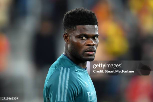 Thomas Partey of Arsenal looks on as he warms up prior to the UEFA Champions League match between RC Lens and Arsenal FC at Stade Bollaert-Delelis on...