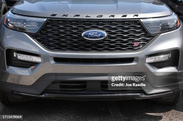 New vehicle sits on a Ford dealership's lot on October 03, 2023 in Miami, Florida. U.S. Automakers show a rise in sales in the third quarter even...