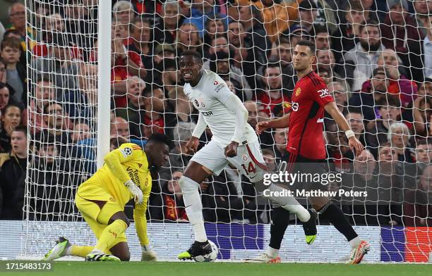 Wilfried Zaha of Galatasaray A.S. Celebrates scoring their first goal during the UEFA Champions League match between Manchester United and...