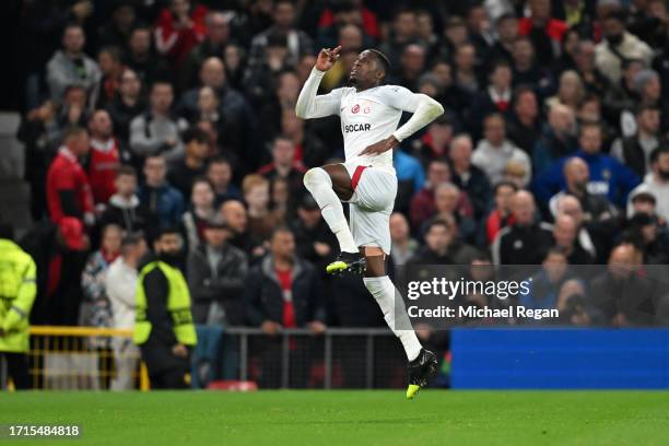 Wilfried Zaha of Galatasaray S.k celebrates after scoring the team's first goal during the UEFA Champions League match between Manchester United and...