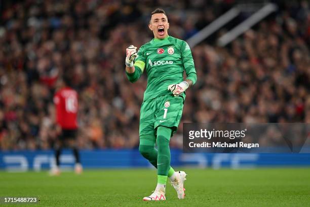 Fernando Muslera of Galatasaray S.k celebrates after Wilfried Zaha of Galatasaray S.k scores the team's first goal during the UEFA Champions League...