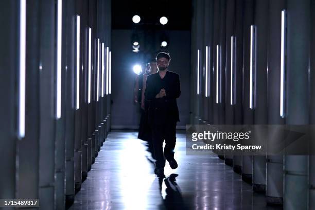 Designer Arthur Avellano acknowledges the audience during the Avellano Womenswear Spring/Summer 2024 show as part of Paris Fashion Week on October...